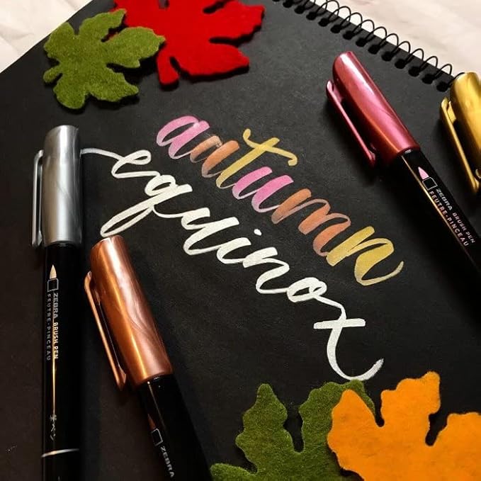 Zebra Pen, Metallic Brush Pens, Gold, Silver, and Rose Gold Ink, Medium Brush Tip Mimics Artist’s Paint Brush for Calligraphy and Lettering, Acid-Free Ink for Light and Dark Paper, 3-Pack (01603)