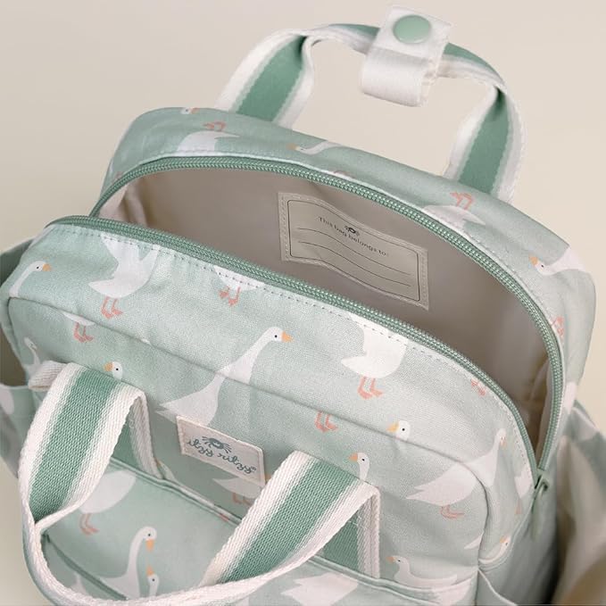 Itzy Ritzy Toddler Backpack - Daycare Bag - Features Adjustable Shoulder Straps, 2 Side Pockets & Spacious Interior with Wipeable Fabric Lining & Name Label, Goose