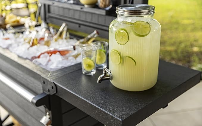Keter Outdoor Rolling Patio Cooler and Insulated Beverage Cart 89.8 Quart Capacity with Fold Down Shelf for Glassware with Built in Bottle Opener